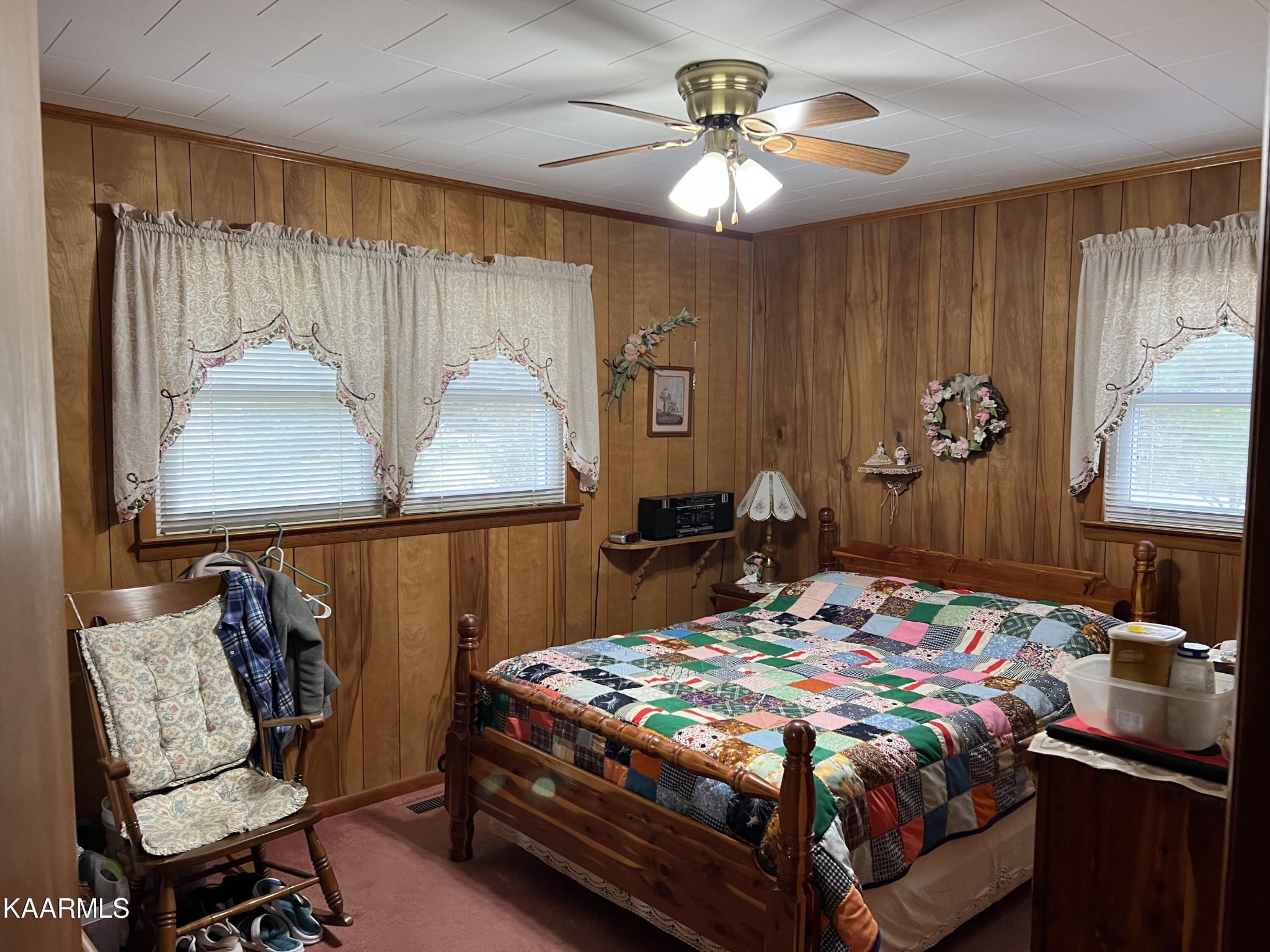 969 Unity Church Road Jamestown, TN 38556 - Photo 14 of 24 a bedroom with a bed a desk and chair