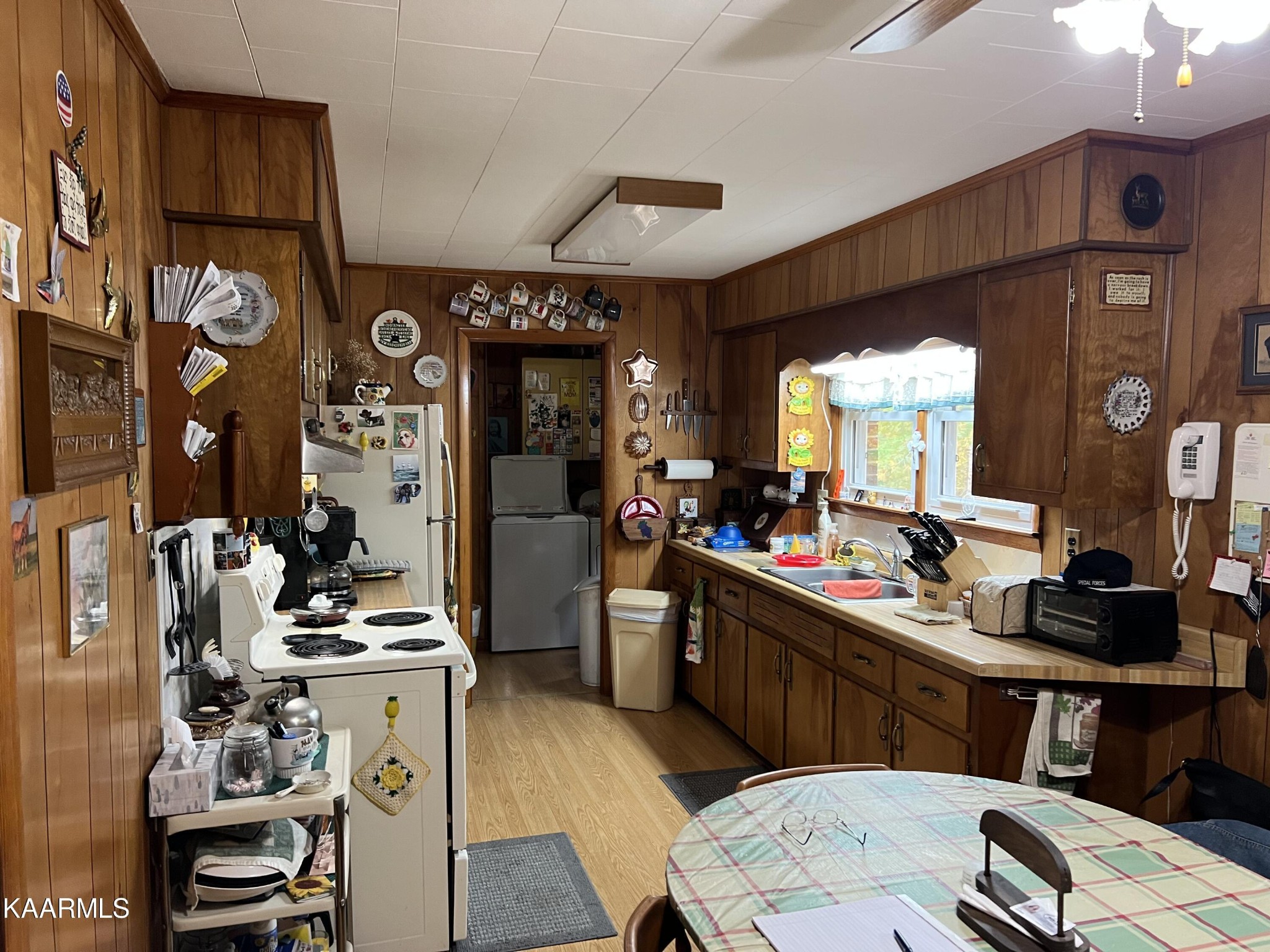 969 Unity Church Road Jamestown, TN 38556 - Photo 16 of 24 a kitchen with stainless steel appliances kitchen island granite countertop a sink and cabinets
