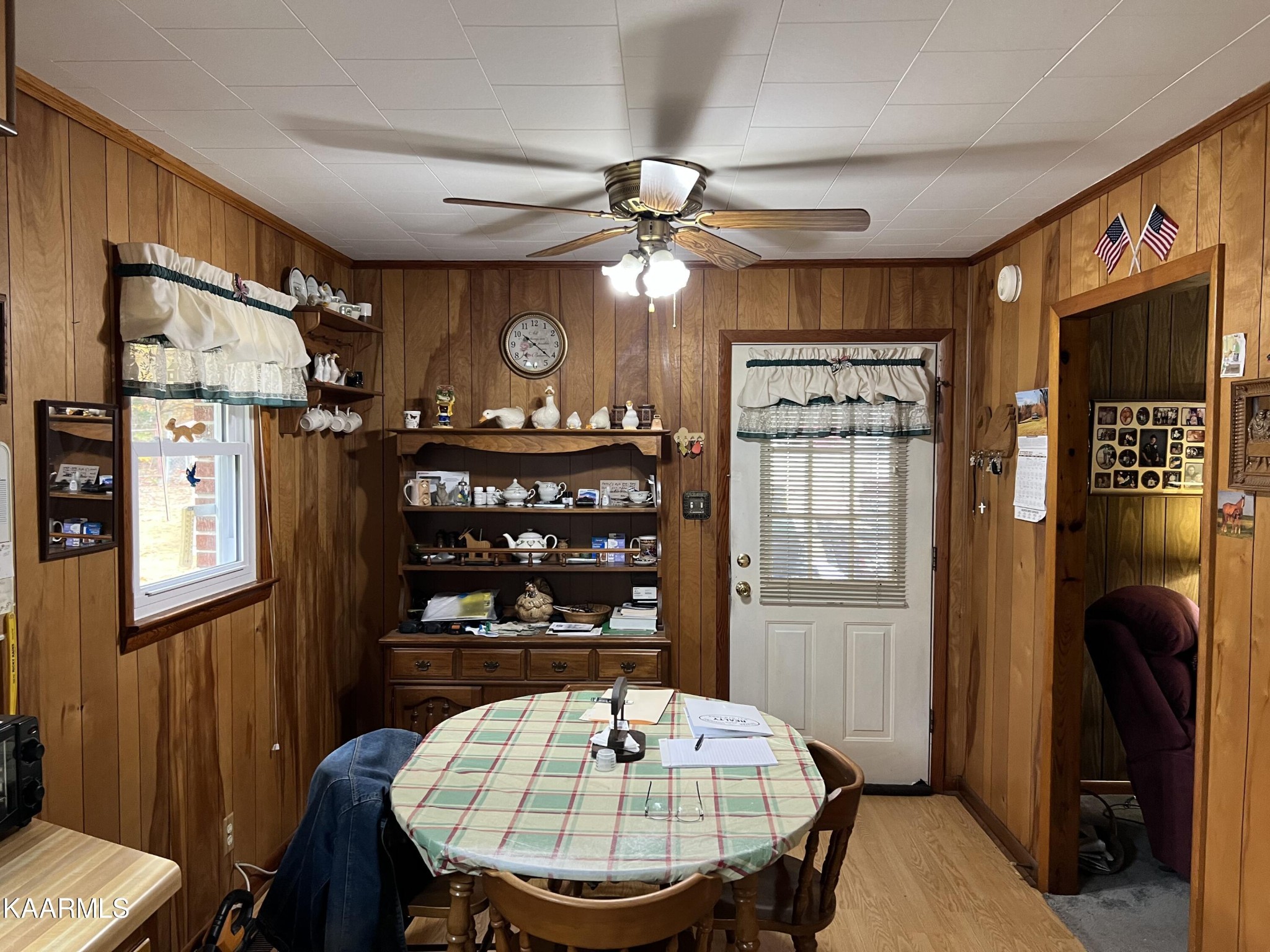 969 Unity Church Road Jamestown, TN 38556 - Photo 18 of 24 a view of a dining room with furniture window and wooden floor