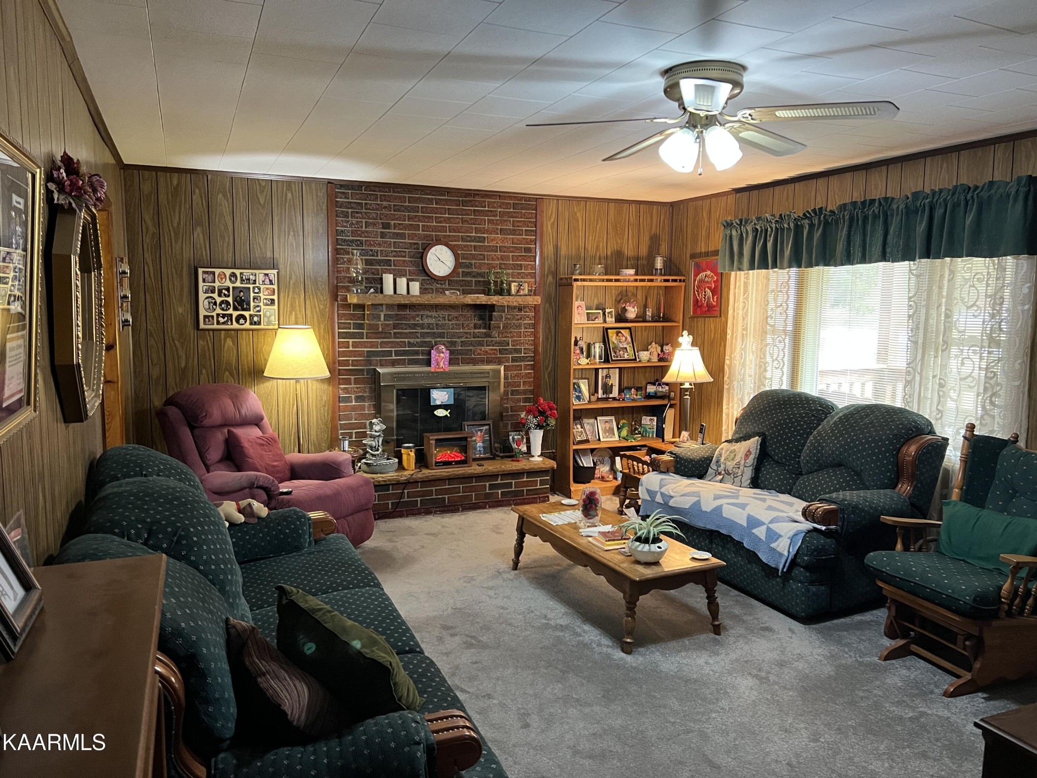 969 Unity Church Road Jamestown, TN 38556 - Photo 23 of 24 a living room with furniture and a large window