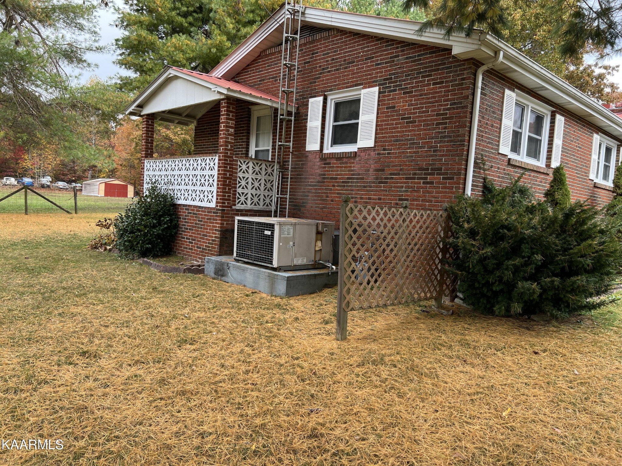 969 Unity Church Road Jamestown, TN 38556 - Photo 7 of 24 a front view of a house with garden