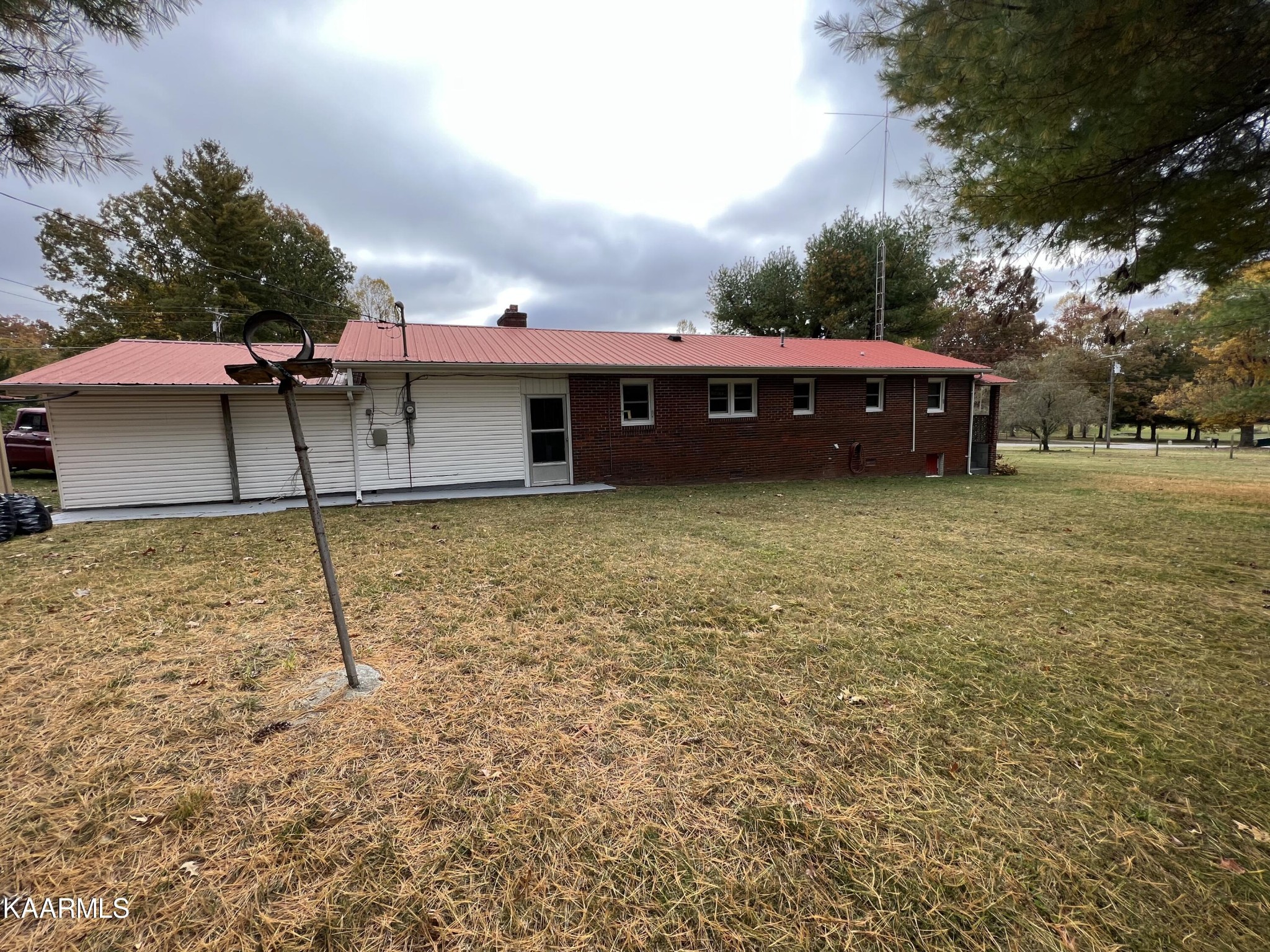 969 Unity Church Road Jamestown, TN 38556 - Photo 8 of 24 a view of a house with a backyard