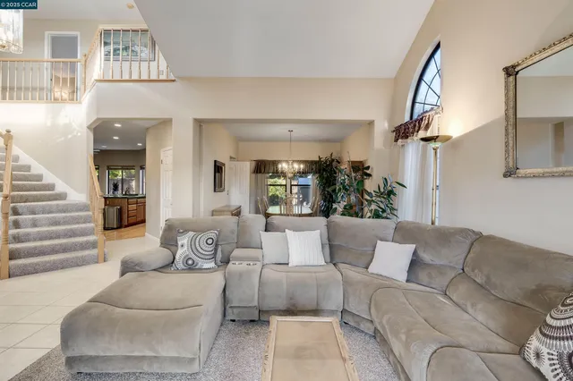a view of a dining room with furniture and window