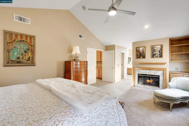 a spacious bathroom with a double vanity sink and a mirror