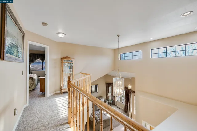 a bathroom with a toilet a sink and a mirror