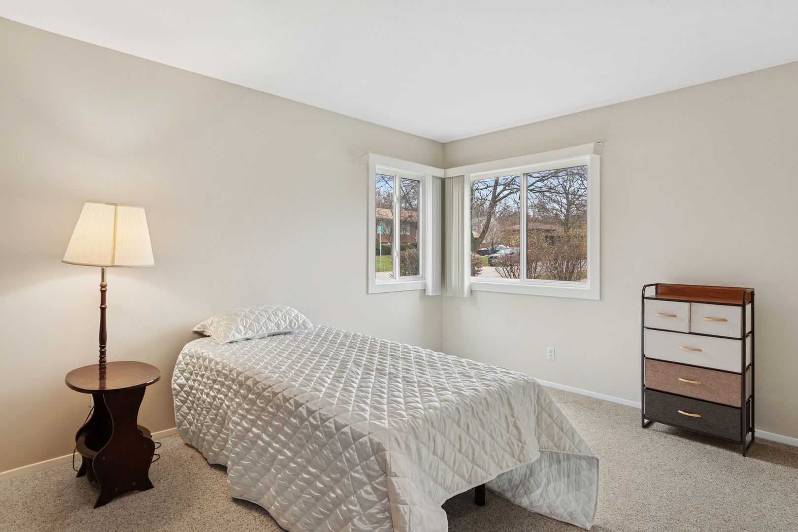 101 Aberdeen Court Geneva, IL 60134 - Photo 12 of 23 a bedroom with a bed and a window