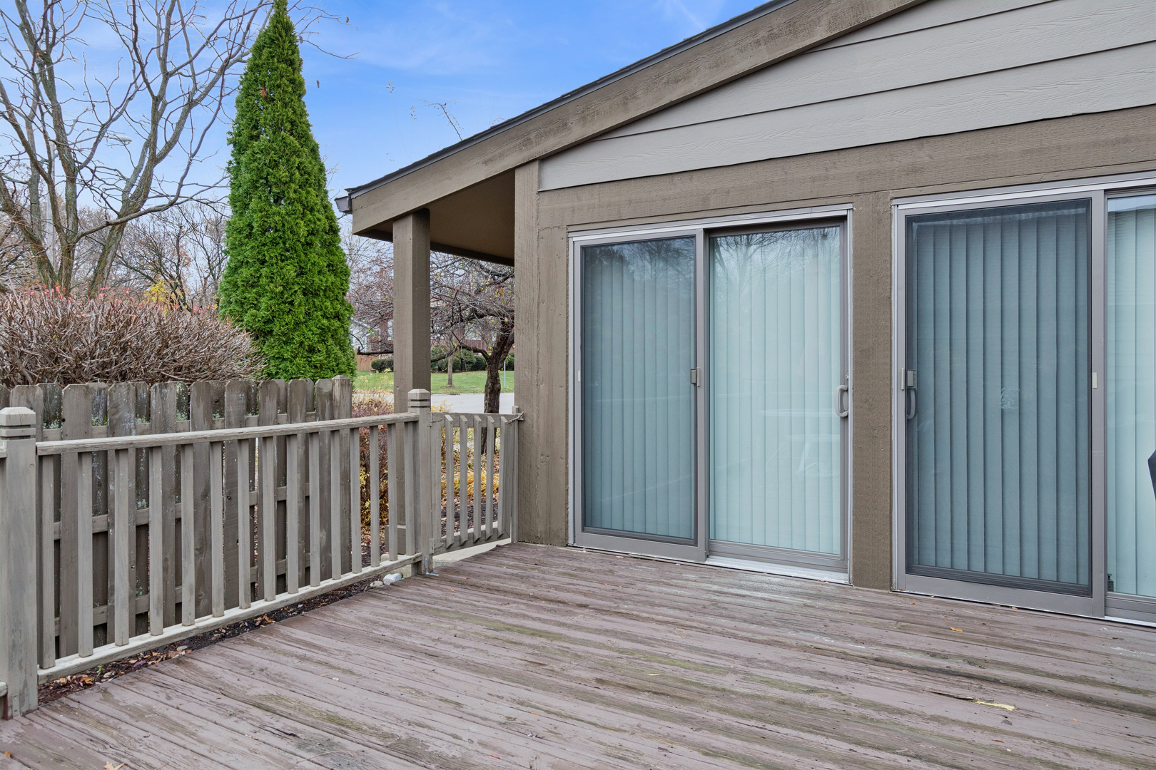 101 Aberdeen Court Geneva, IL 60134 - Photo 17 of 23 a view of a house with a wooden deck