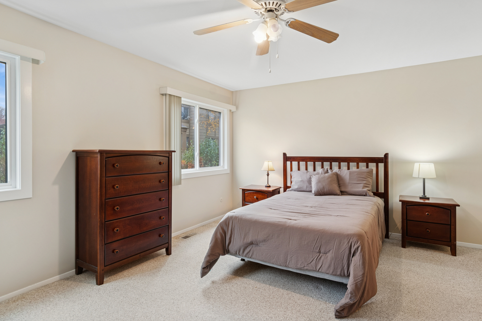 101 Aberdeen Court Geneva, IL 60134 - Photo 10 of 23 a bedroom with a bed and a chandelier