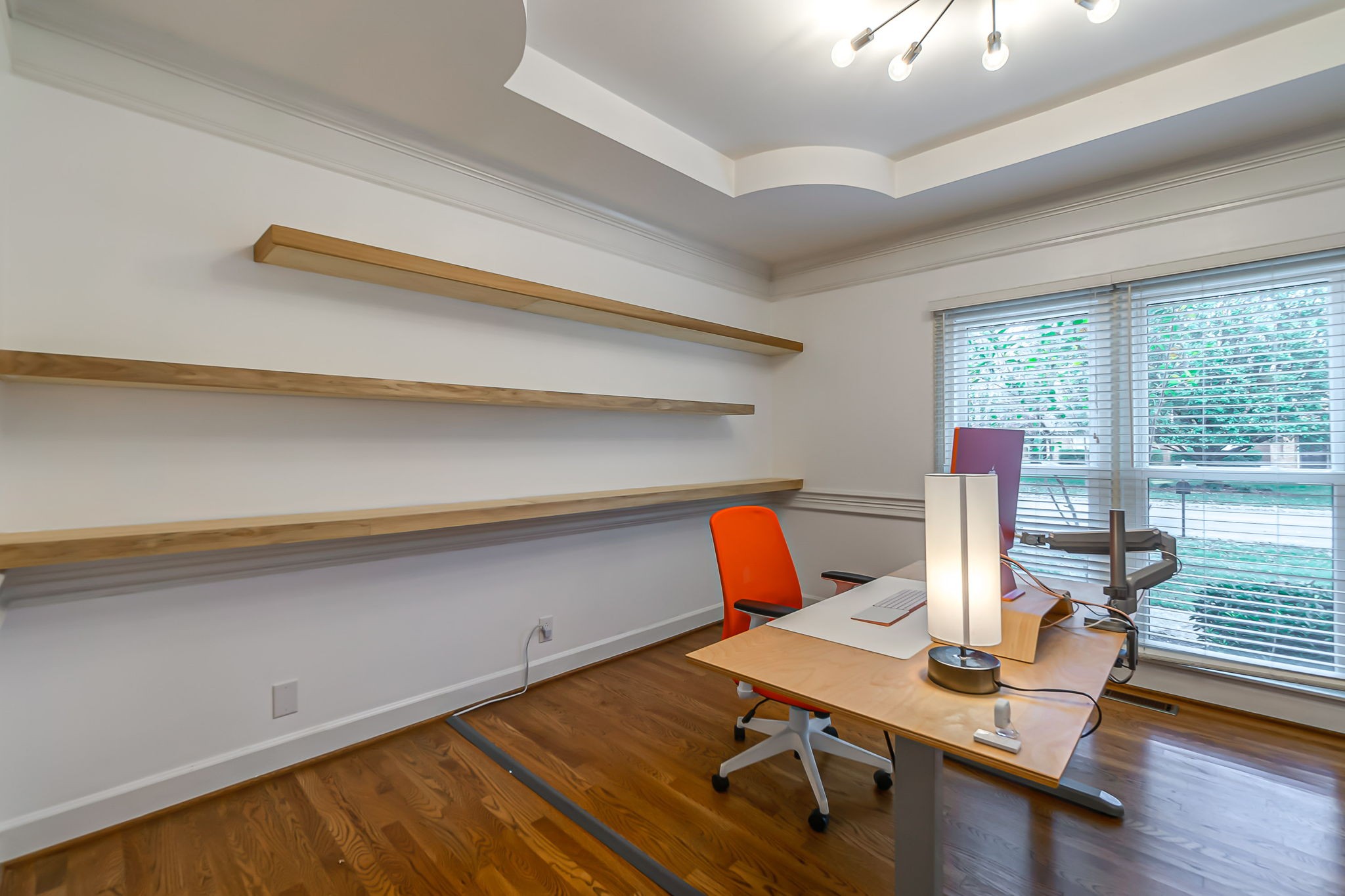 555 Ridgestone Drive Franklin, TN 37064 - Photo 17 of 46 a workspace with furniture and wooden floor