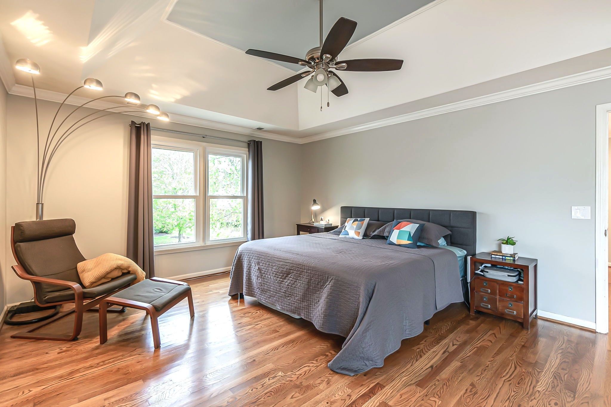 555 Ridgestone Drive Franklin, TN 37064 - Photo 20 of 46 a bedroom with a bed and a chair