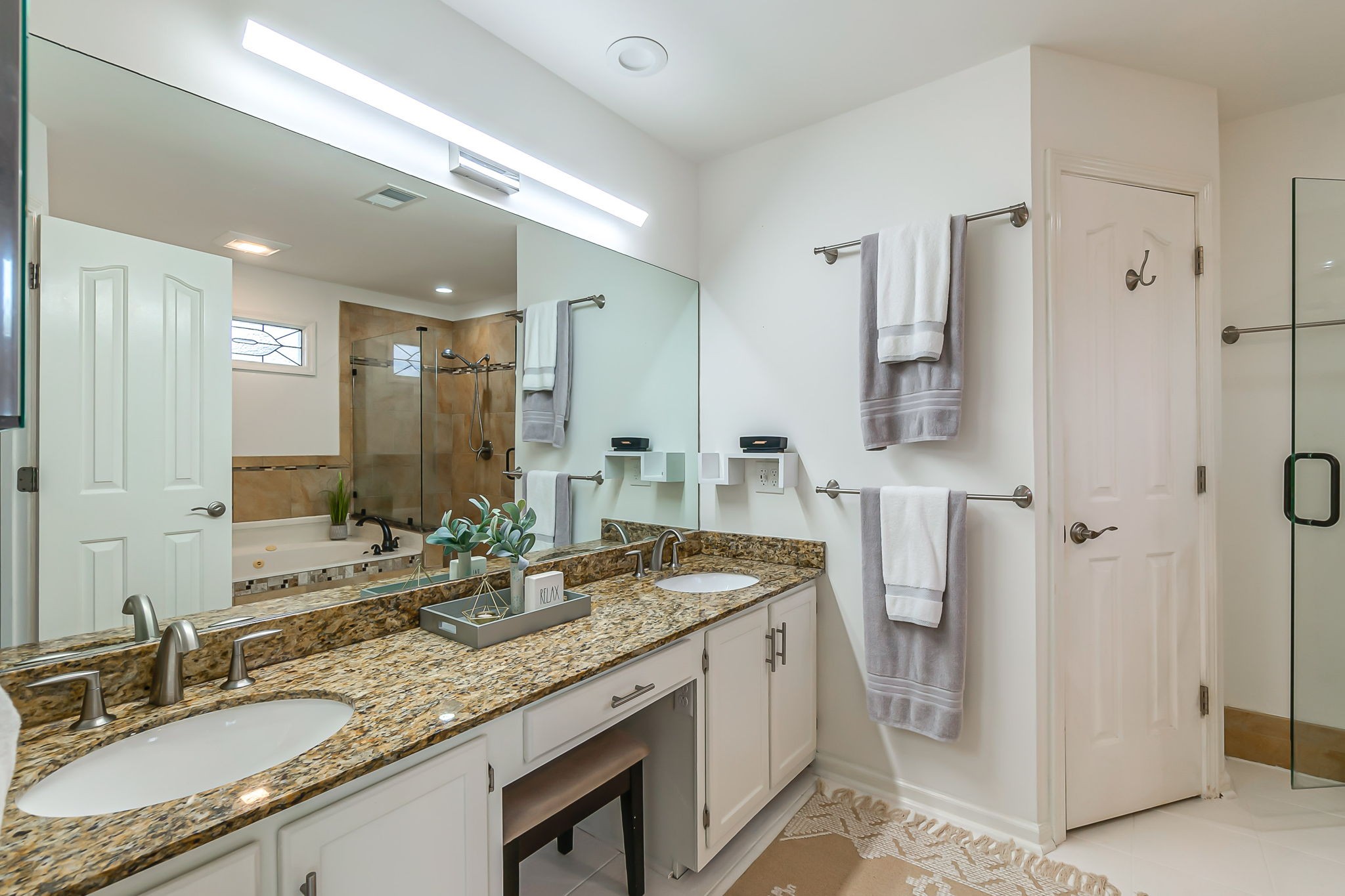 555 Ridgestone Drive Franklin, TN 37064 - Photo 23 of 46 a bathroom with a granite countertop sink and a mirror