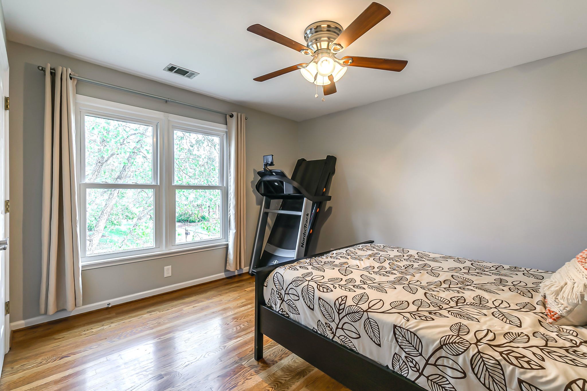 555 Ridgestone Drive Franklin, TN 37064 - Photo 26 of 46 a bedroom with a bed and wooden floor