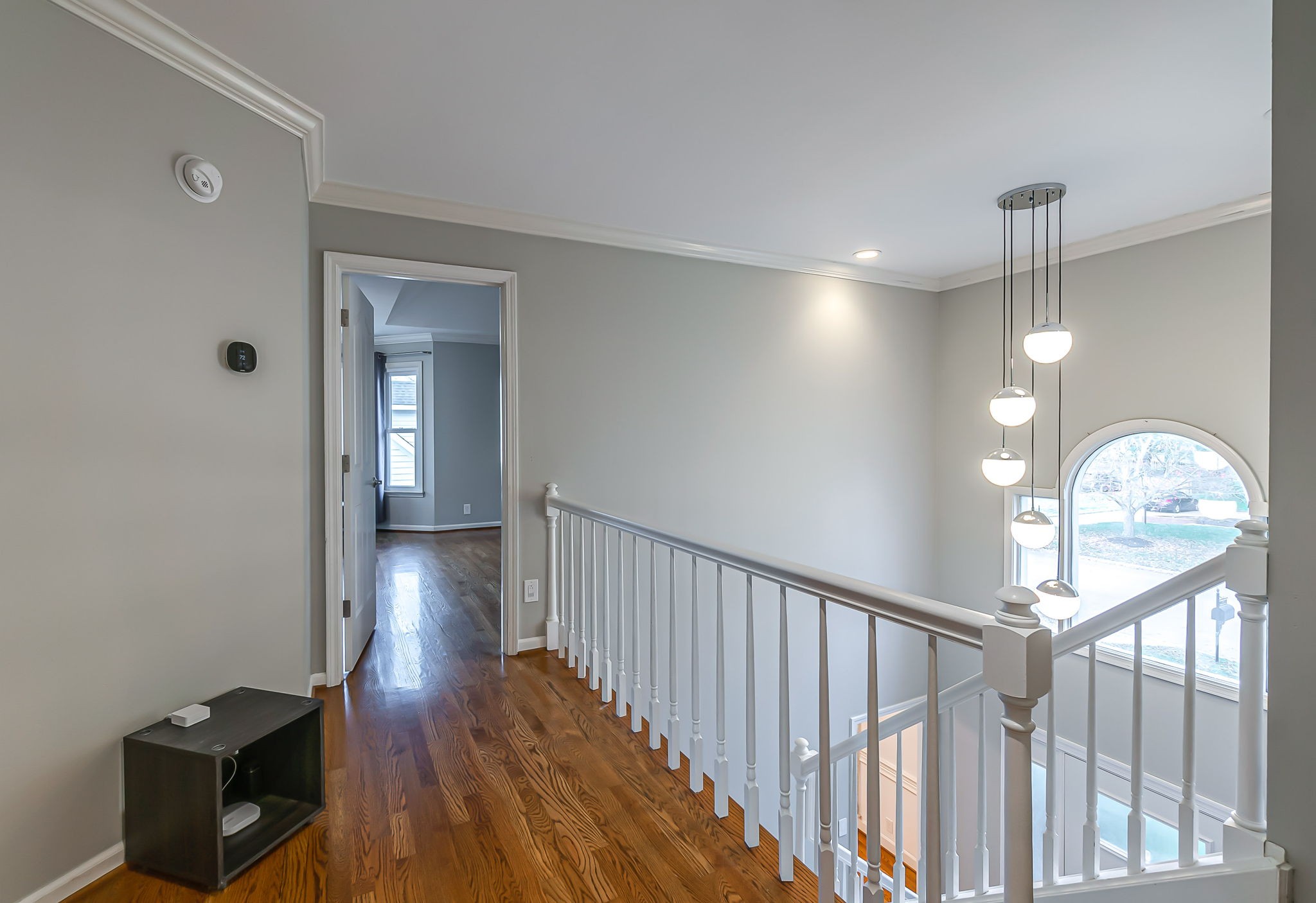 555 Ridgestone Drive Franklin, TN 37064 - Photo 32 of 46 a view of a hallway with wooden floor and stairs