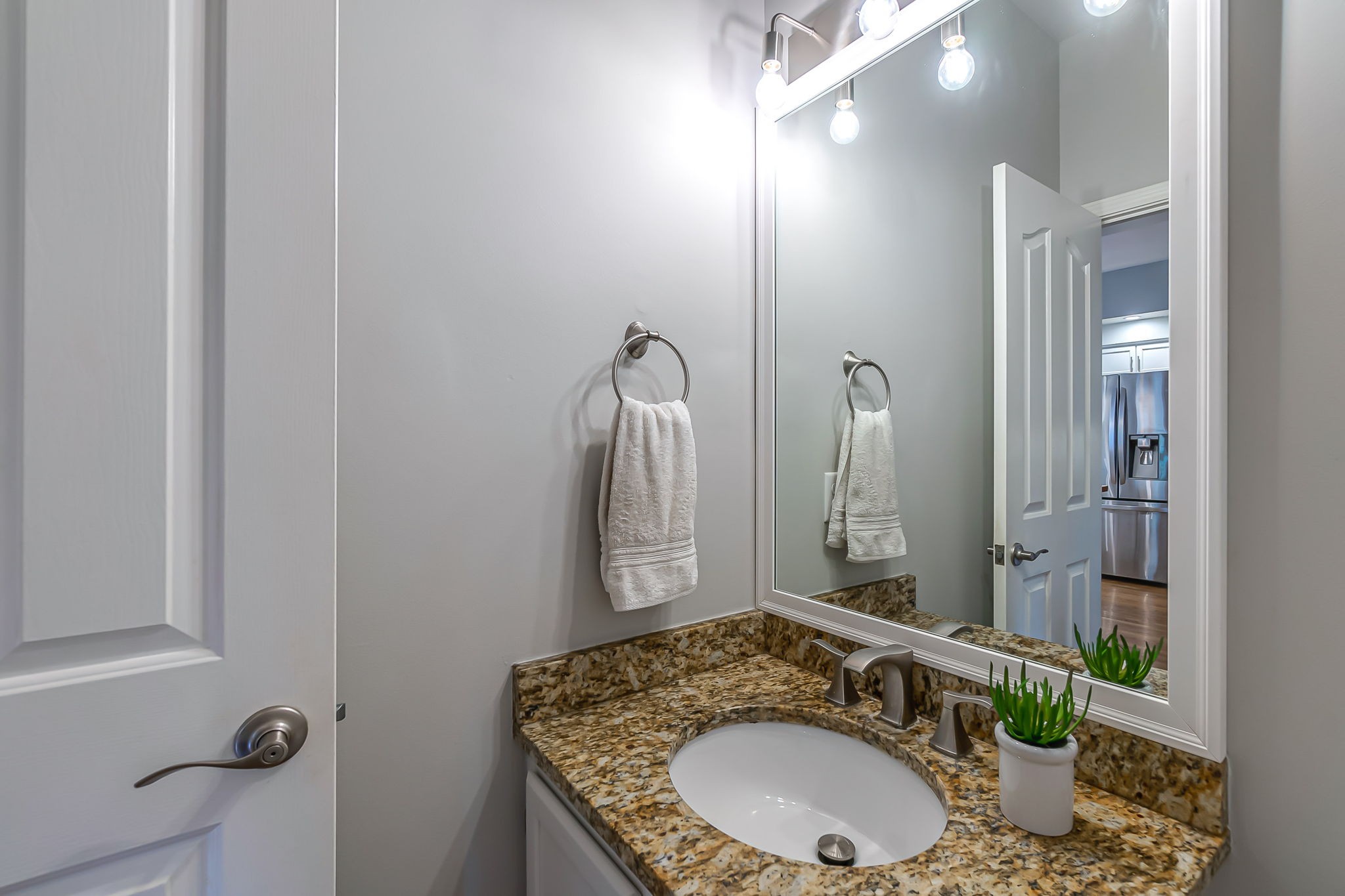 555 Ridgestone Drive Franklin, TN 37064 - Photo 33 of 46 a bathroom with a granite countertop sink and a mirror