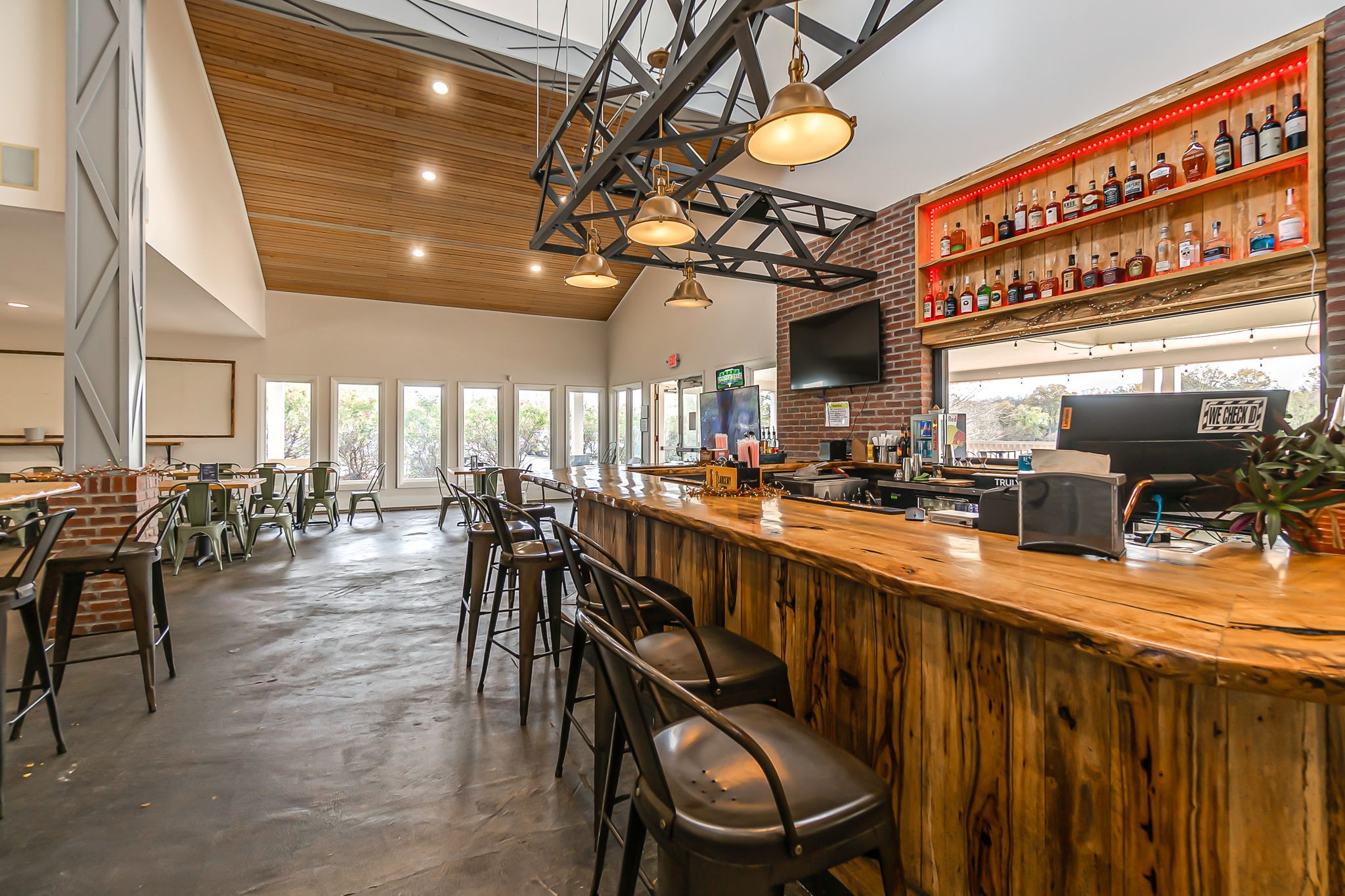 555 Ridgestone Drive Franklin, TN 37064 - Photo 43 of 46 a dining room with wooden floor a chandelier a wooden table and chairs