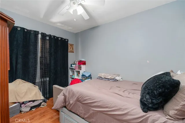 a bedroom with a bed and a closet