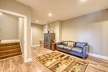 1309 Ridge Pointe Way Blairsville, GA 30512 - Photo 20 of 73 a living room with furniture and a rug