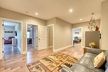 1309 Ridge Pointe Way Blairsville, GA 30512 - Photo 21 of 73 a spacious bedroom with a bed and a view of bathroom