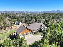 1309 Ridge Pointe Way Blairsville, GA 30512 - Photo 5 of 73 an aerial view of a house with a garden