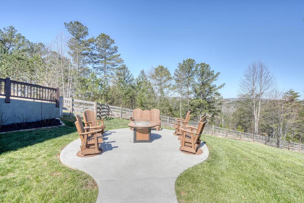 1309 Ridge Pointe Way Blairsville, GA 30512 - Photo 55 of 73 a view of a chair and table in the garden