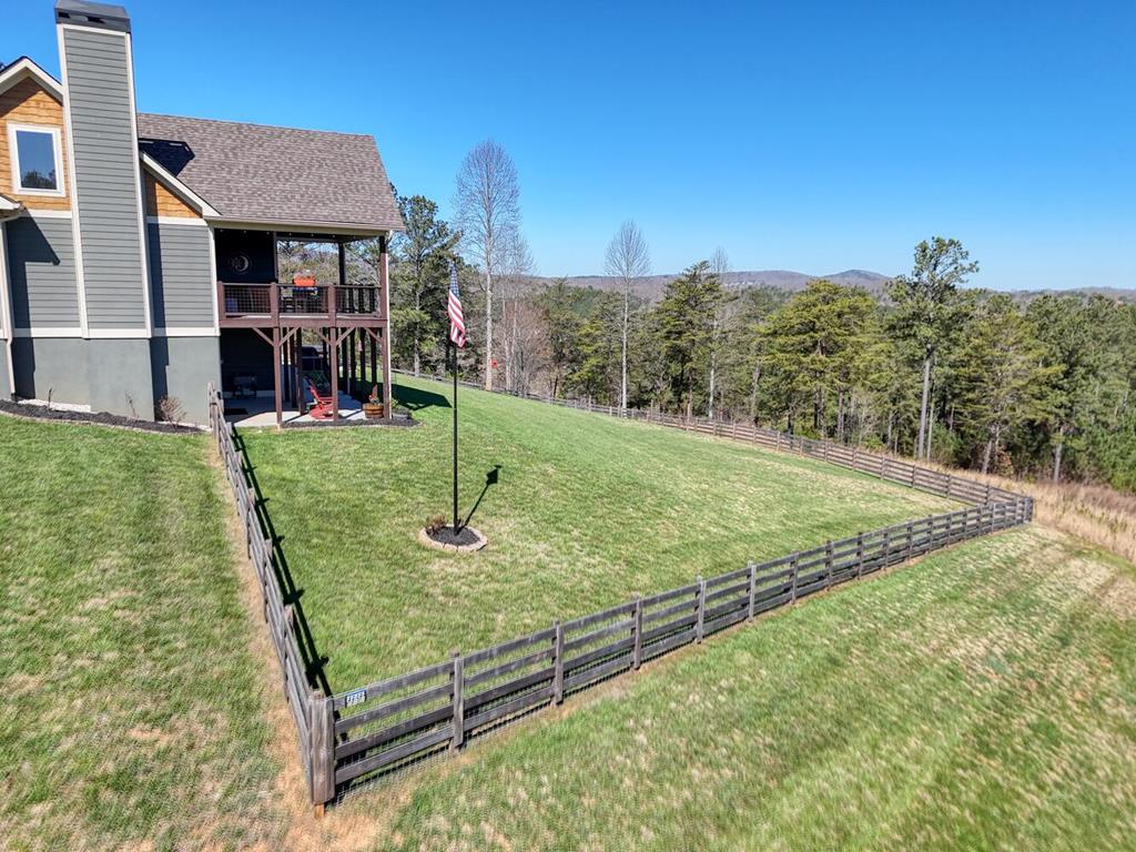 1309 Ridge Pointe Way Blairsville, GA 30512 - Photo 57 of 73 a view of a backyard with ocean view