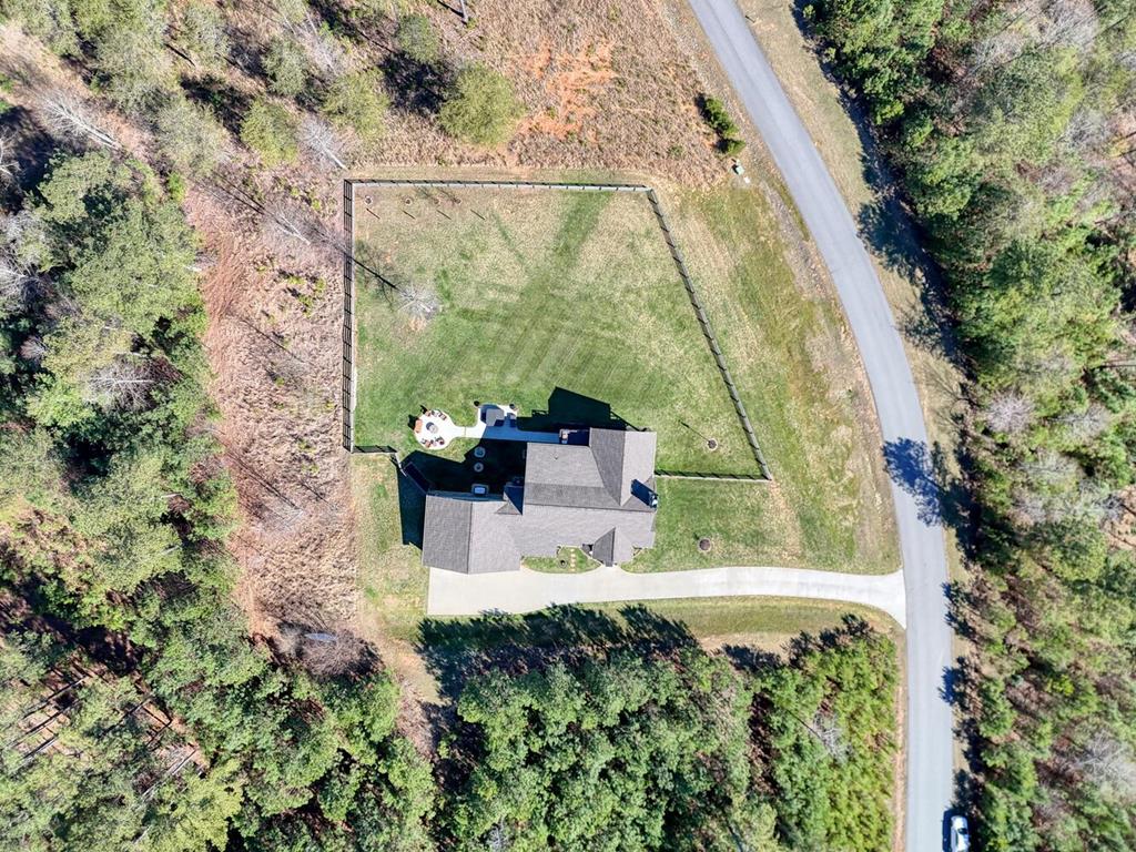 1309 Ridge Pointe Way Blairsville, GA 30512 - Photo 59 of 73 an aerial view of a house with a yard