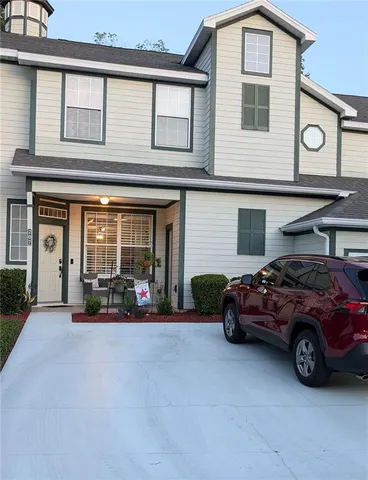 a car parked in front of a house