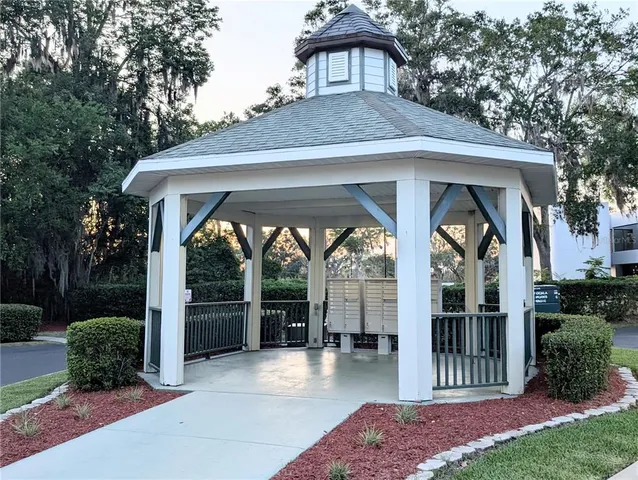 a view of a house with a yard balcony and balcony