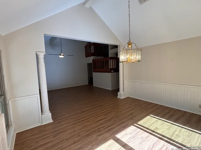 a view of a livingroom with wooden floor
