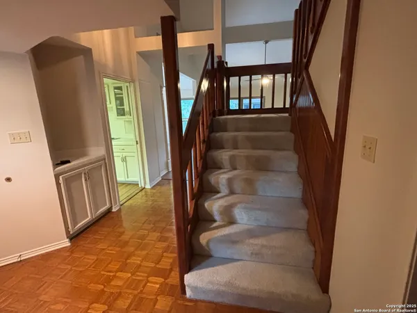a view of an entryway with staircase
