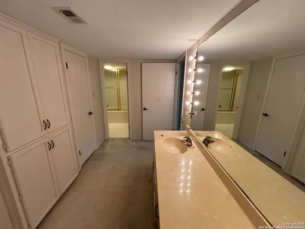 a view of a bathroom with tub