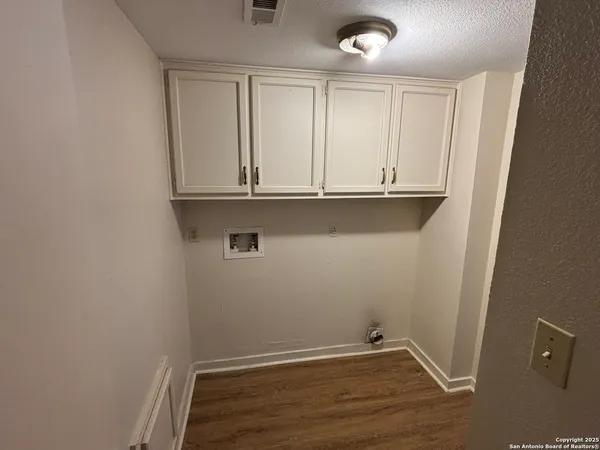 a view of balcony with wooden floor