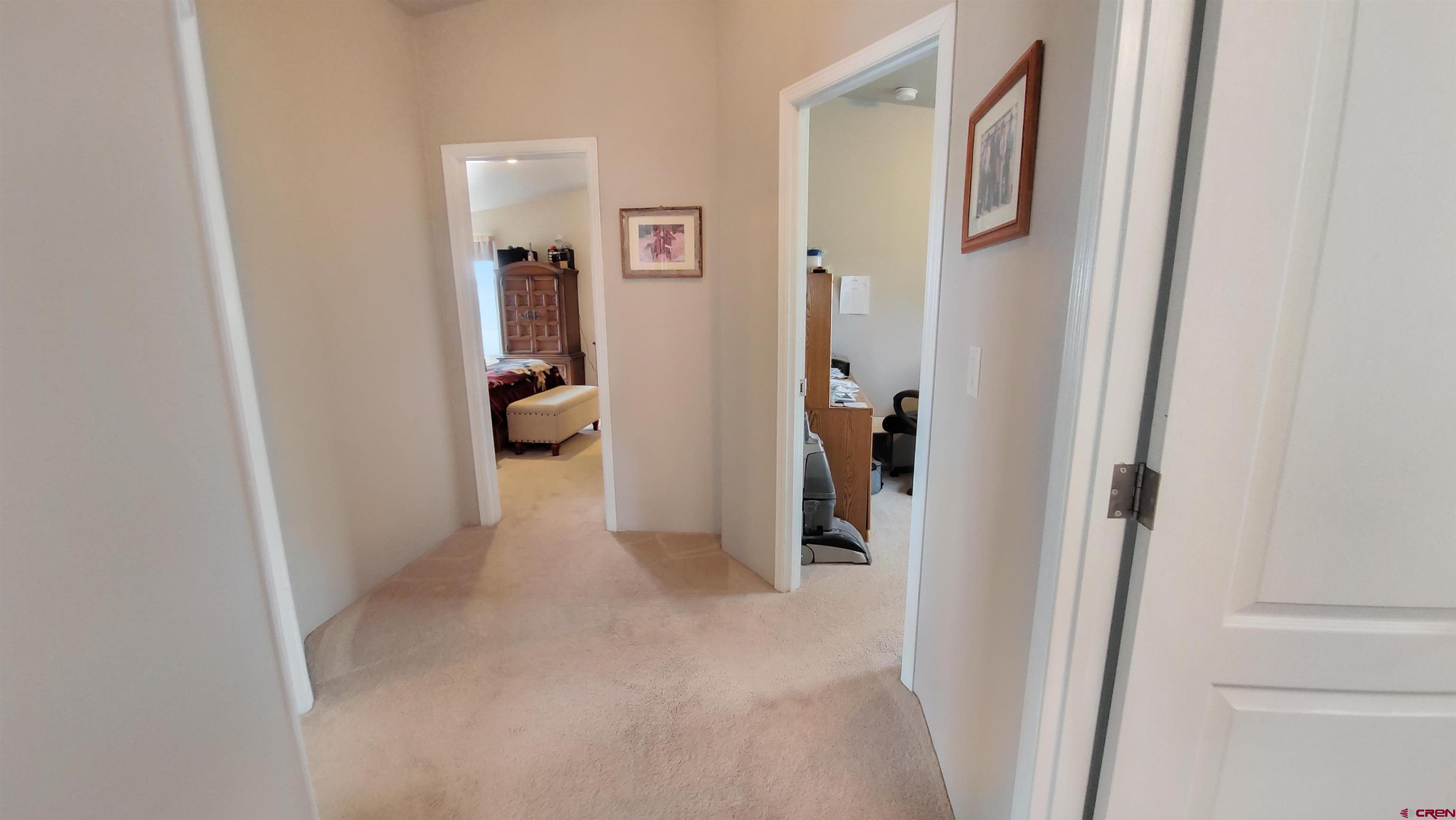 13635 County Road 23 Cortez, CO 81321 - Photo 21 of 30 a view of a hallway with bathroom and bathroom