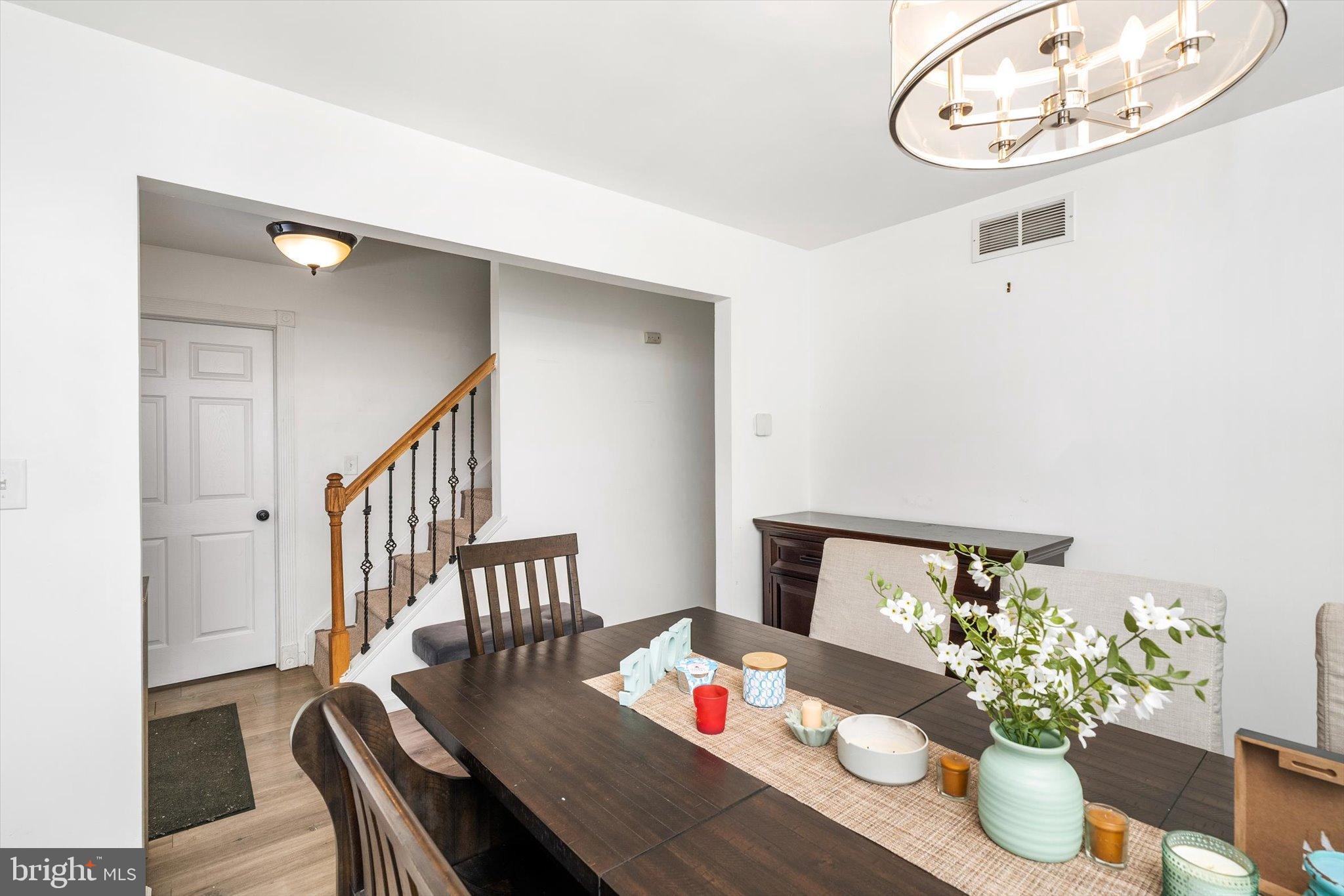 3 Scenic View Drive Sicklerville, NJ 08081 - Photo 4 of 26 a dining room with furniture and a potted plant
