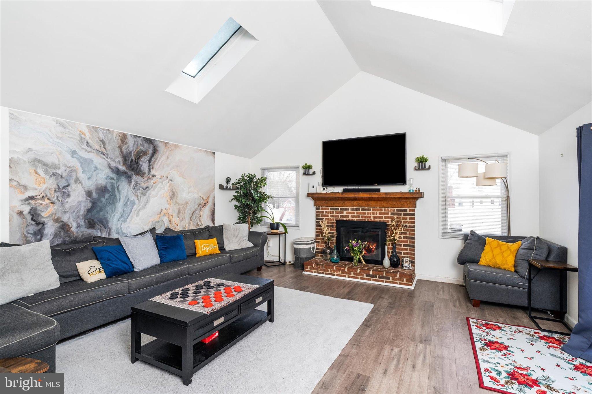 3 Scenic View Drive Sicklerville, NJ 08081 - Photo 9 of 26 a living room with furniture and a fireplace