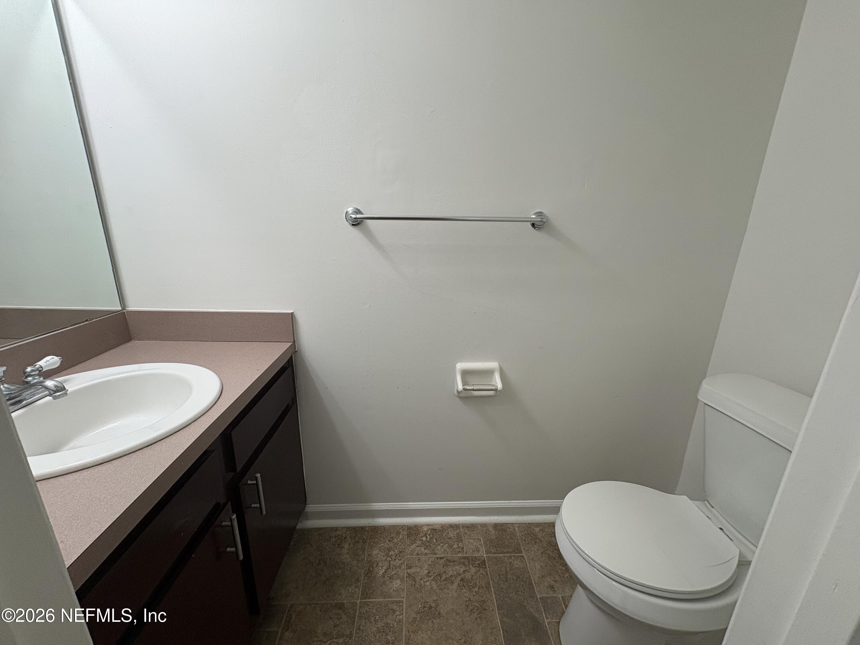 4647 Barnes Road South Jacksonville, FL 32207 - Photo 11 of 11 a bathroom with a sink and a toilet