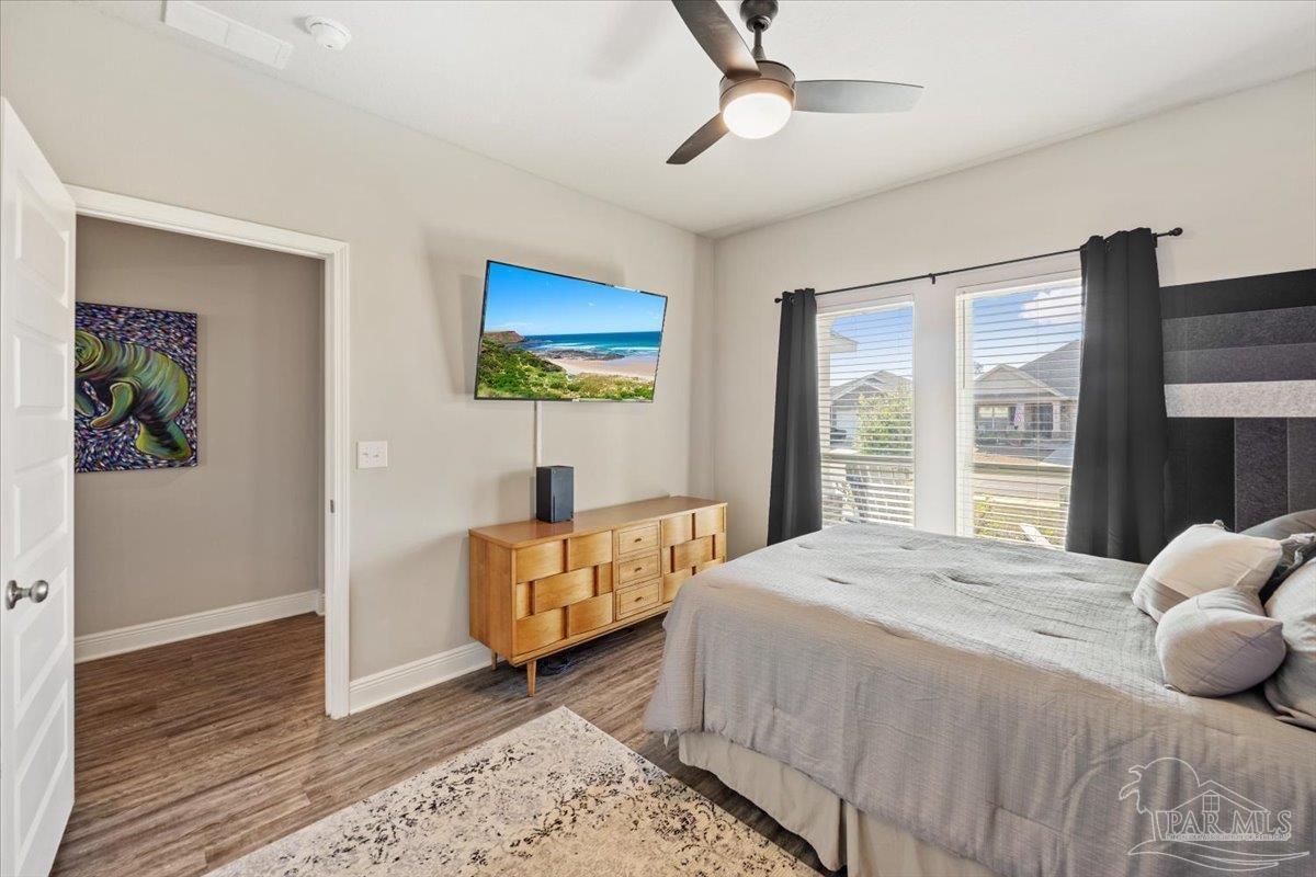 5344 Red Shoulder Road Pace, FL 32571 - Photo 22 of 28 a bedroom with a bed and a couch