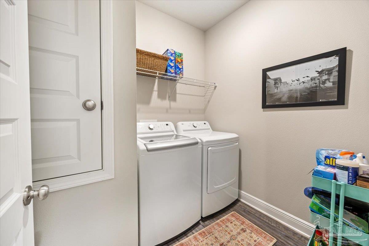 5344 Red Shoulder Road Pace, FL 32571 - Photo 26 of 28 a utility room with dryer and washer