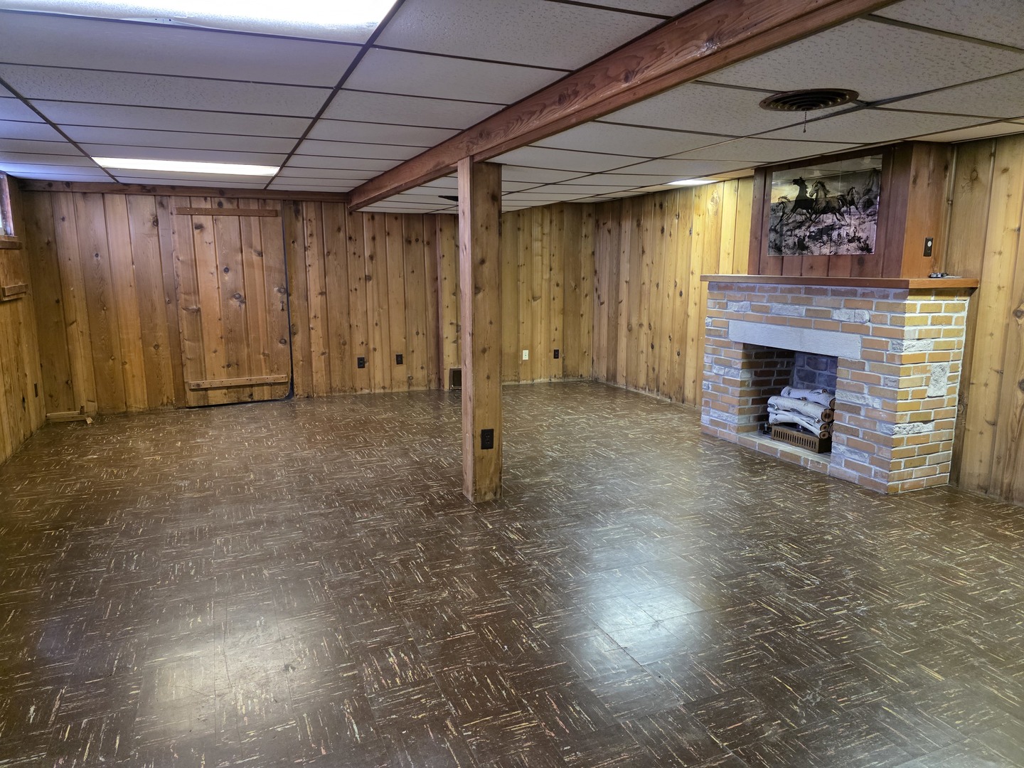 705 West Commercial Street Lyndon, IL 61261 - Photo 12 of 17 a view of an empty room with a fireplace