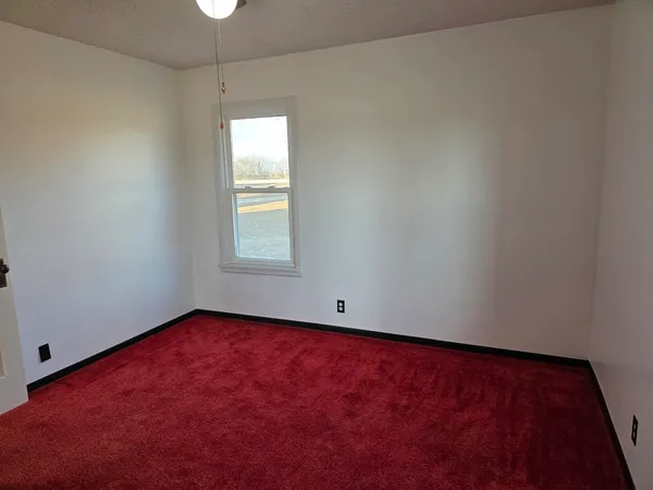 an empty room with a window