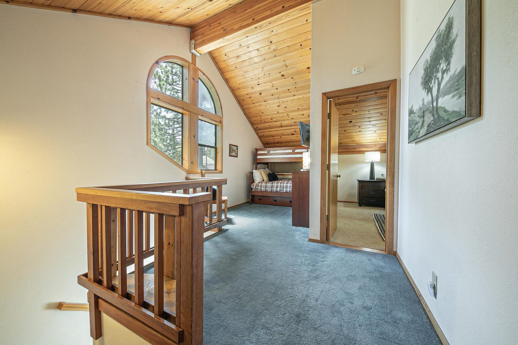 13515 Ski View Loop Truckee, CA 96161 - Photo 23 of 28 a view of a hallway with a door and stairs