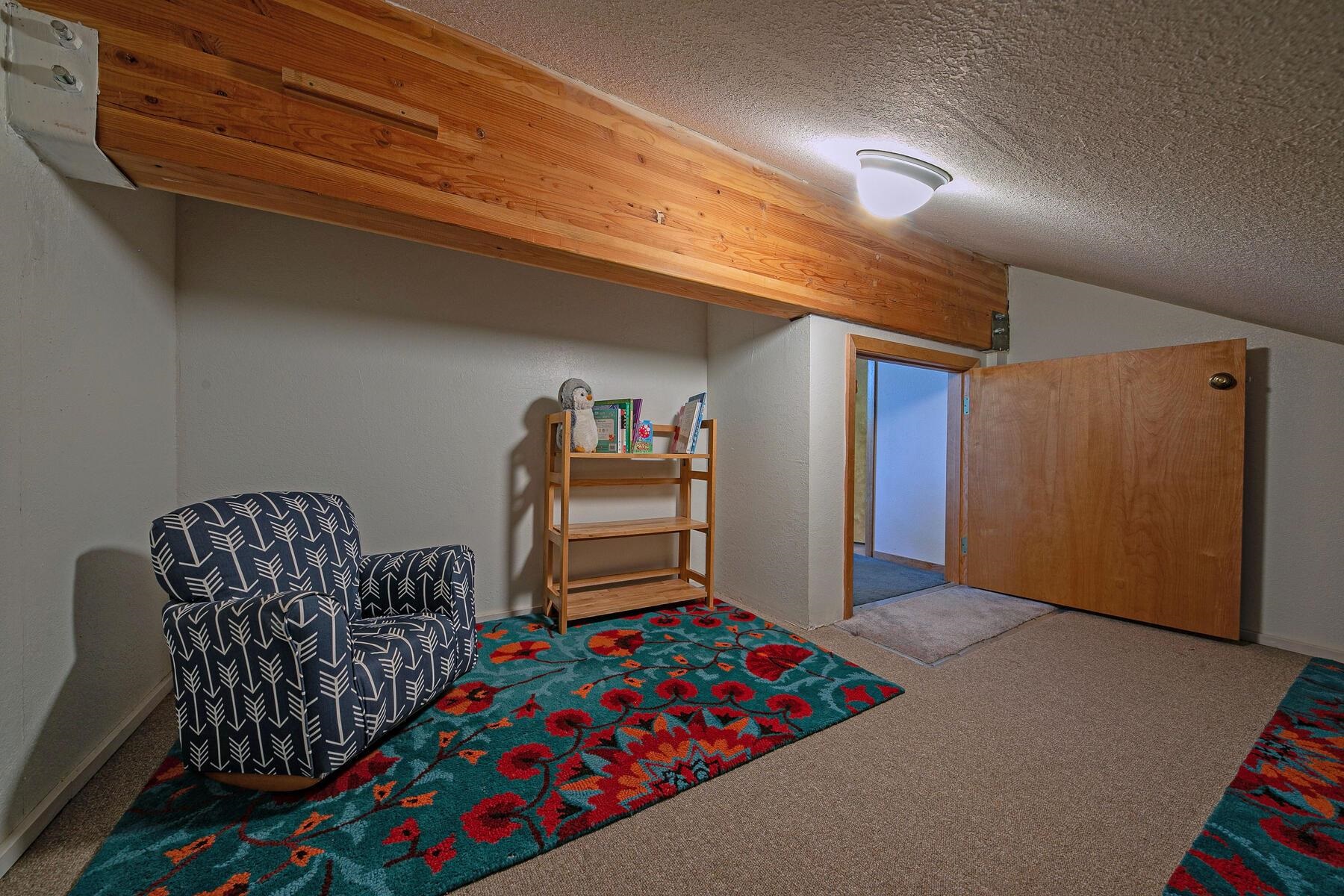 13515 Ski View Loop Truckee, CA 96161 - Photo 28 of 28 a bedroom with furniture and a window