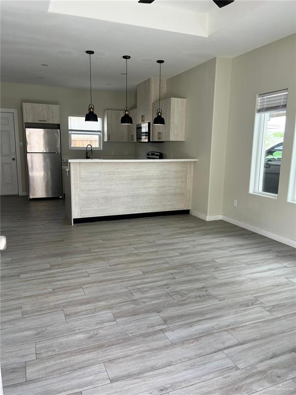1320 North McColl Road, Unit 2 Edinburg, TX 78541 - Photo 12 of 24 a view of a room with wooden floor