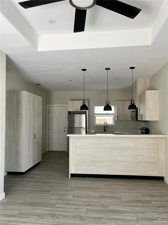 1320 North McColl Road, Unit 2 Edinburg, TX 78541 - Photo 8 of 24 a living room with furniture and a wooden floor