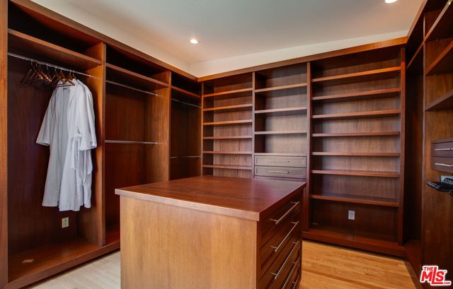 a kitchen with a refrigerator and countertop