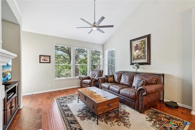a living room with furniture and a window