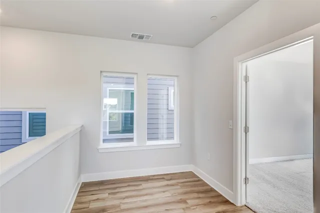 a bathroom with a sink and a window