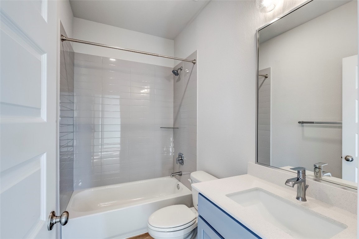 715 Bernese Pass Austin, TX 78745 - Photo 28 of 38 Bathroom with vanity and shower / bath combination
