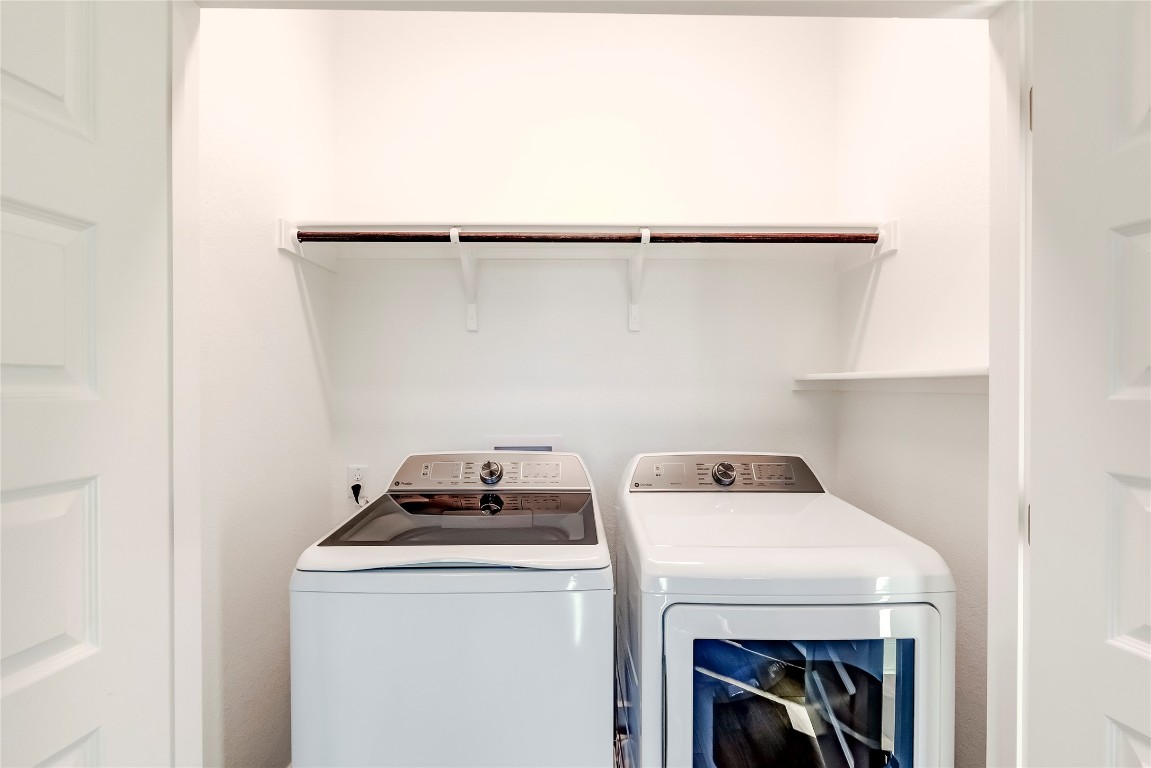715 Bernese Pass Austin, TX 78745 - Photo 30 of 38 Washroom featuring washing machine and dryer