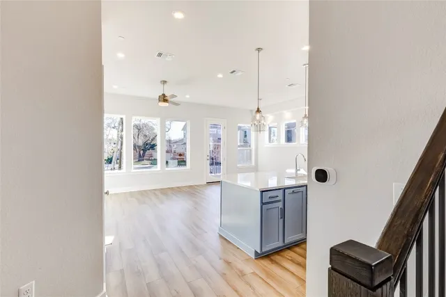 a view of swimming pool with outdoor seating and plants